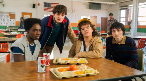 assets/stranger-things-season-5-actors-at-table-1.jpeg