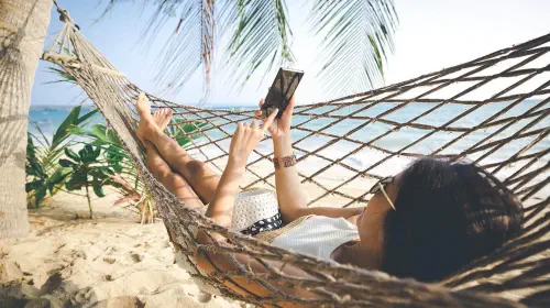 assets/esim-phone-hammock-shutterstock_1104305831-Peera-stockfoto.jpeg