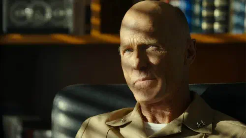 assets/ed-harris-in-top-gun-maverick-best-modern-action-movie-streaming-success-paramount-december-2025.jpeg