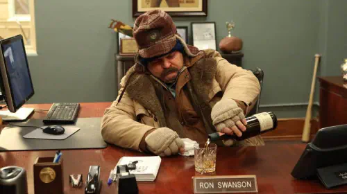 assets/nick-offerman-as-ron-swanson-in-parks-and-recreation-best-sitcom-streaming.jpeg