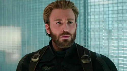 assets/chris-evans-captain-america-with-a-beard-and-looking-lost-in-thought-in-avengers-infinity-war.jpeg