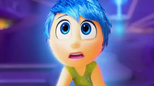 assets/joy-looking-stunned-at-something-off-screen-in-inside-out-2.jpeg