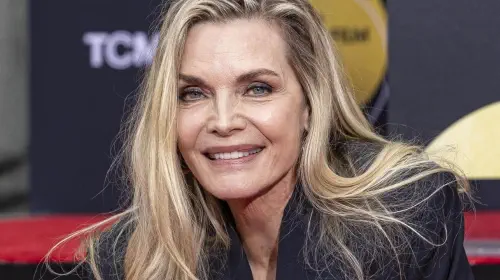 assets/michelle-pfeiffer-smiling-at-her-walk-of-fame-ceremony.jpeg