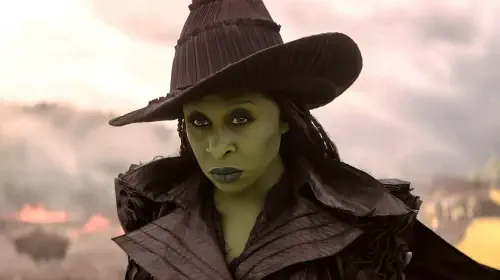assets/cynthia-erivo-as-elphaba-glaring-while-flying-over-the-yellow-brick-road-in-wicked-for-good.jpeg