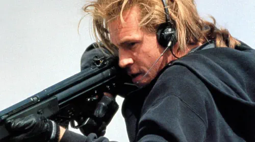 assets/val-kilmer-aiming-a-gun-in-heat.jpeg