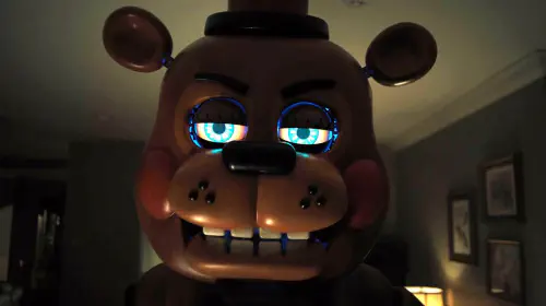 assets/toy-freddy-looking-menacingly-into-the-camera-in-five-nights-at-freddy-s-2.jpeg