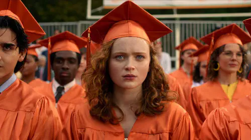 assets/max-at-her-graduation-in-stranger-things-season-5-finale.jpeg