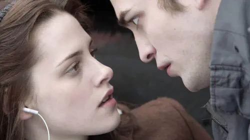 assets/kristen-stewart-and-robert-pattinson-as-bella-and-edward.jpeg