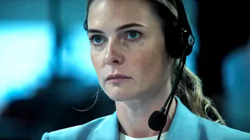 assets/rebecca-ferguson-s-olivia-looking-worried-with-her-headset-on-in-a-house-of-dynamite.jpeg
