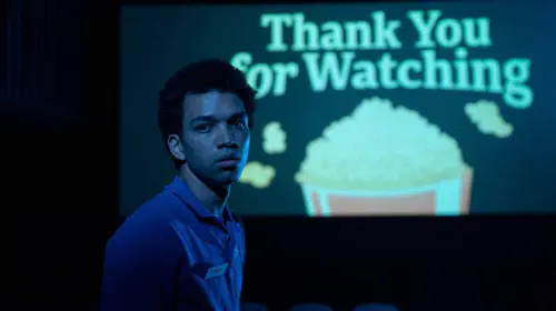 assets/justice-smith-in-a-movie-theater-in-jane-schoenbrun-movie-i-saw-the-tv-glow.jpeg