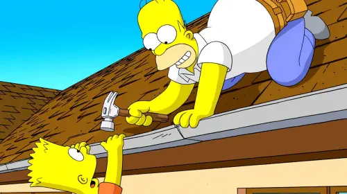 assets/homer-wields-a-hammer-as-bart-hangs-onto-a-gutter-in-the-simpsons-movie.jpeg