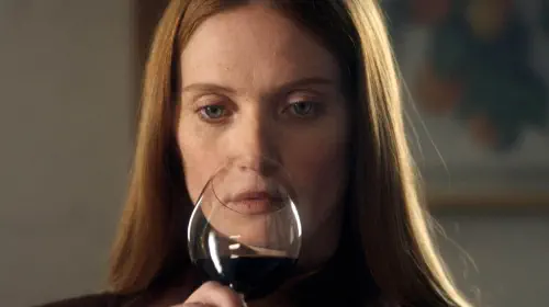 assets/fleur-geffrier-looking-intense-while-drinking-wine-in-drops-of-god-season-1.jpeg