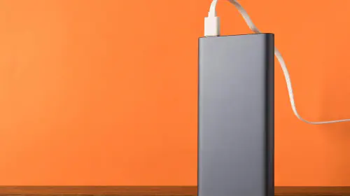 assets/Power-bank-on-desk-plugged-in-and-being-charged.jpeg