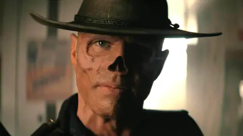assets/walton-goggins-the-ghoul-looking-curiously-into-the-camera-in-fallout-season-2.jpeg