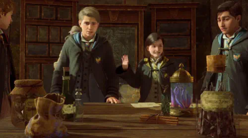 assets/students-looking-at-a-table-in-a-class-in-hogwarts-legacy.jpeg
