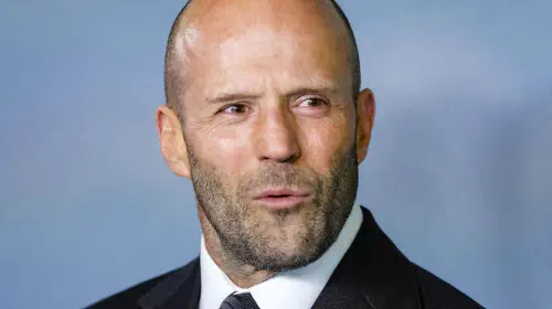 assets/jason-statham-looking-intrigued-on-a-red-carpet.jpeg