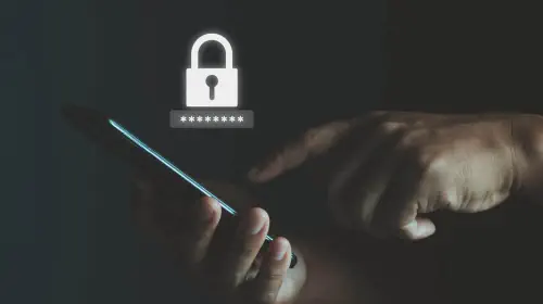 assets/Man-holding-phone-with-password-security-lock-icon.jpeg