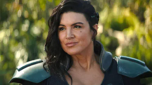 assets/gina-carano-as-cara-dune-wearing-dark-armor-smiling-off-screen-in-the-mandalorian.jpeg