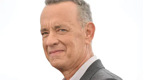 assets/tom-hanks-at-cannes-with-a-sunny-background.jpeg
