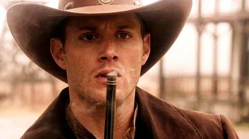 assets/cowboy-dean-winchester-blowing-smoke-from-the-barrel-of-his-gun.jpeg