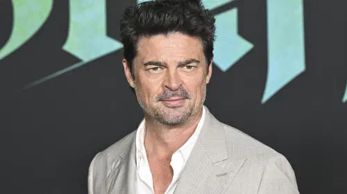 assets/karl-urban-smiling-on-the-bluff-red-carpet.jpeg