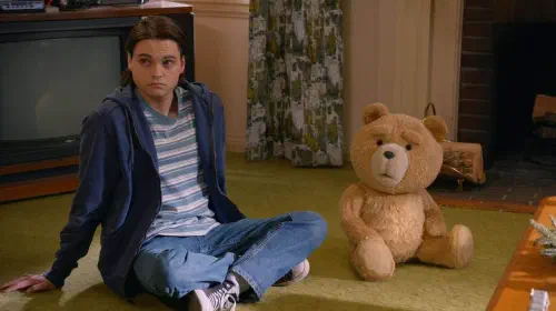 assets/max-burkholder-seth-macfarlane-as-john-bennett-ted-the-bear-in-ted-2.jpeg