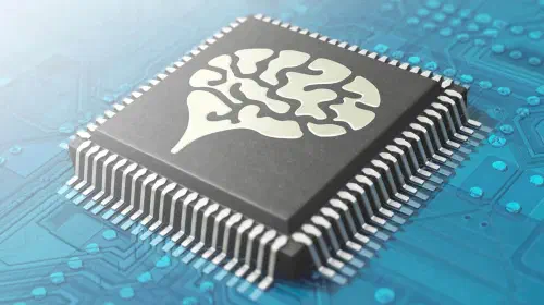 assets/Computer-chip-illustration-with-AI-artificial-intelligence-brain-imprinted-2.jpeg