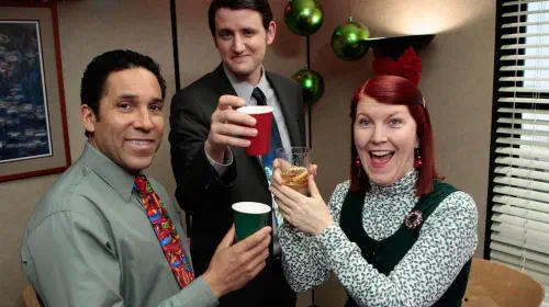 assets/oscar-gabe-and-meredith-toasting-the-camera-in-a-promotional-image-from-the-office.jpeg