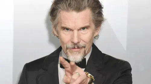 assets/ethan-hawke-pointing-two-fingers-at-the-camera.jpeg