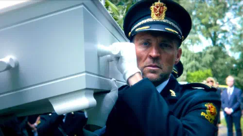 assets/tobias-santelmann-s-harry-in-his-officer-uniform-helping-to-carry-a-casket-in-jo-nesb-s-detective-hole.jpeg
