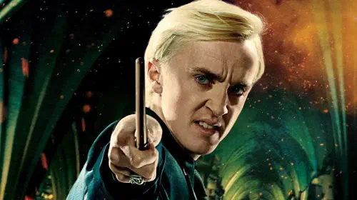 assets/a-poster-of-tom-felton-s-draco-waving-his-wand-in-harry-potter-and-the-deathly-hallows-part-2.jpeg