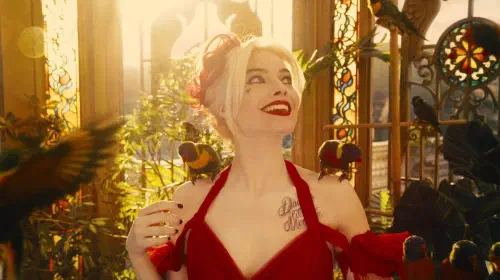 assets/margot-robbie-smiling-as-harley-quinn-in-james-gunn-s-the-suicide-squad.jpeg