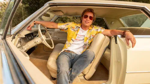 assets/cliff-booth-poses-in-a-car-in-once-upon-a-time-in-hollywood.jpeg