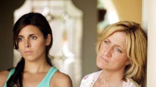assets/edie-falco-and-jamie-lynn-sigler-in-the-sopranos.jpeg