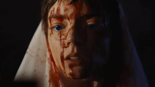 assets/alia-atreides-with-a-bloody-face-in-dune-part-3.jpeg