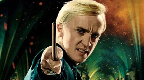 assets/a-poster-of-tom-felton-s-draco-waving-his-wand-in-harry-potter-and-the-deathly-hallows-part-2.jpeg