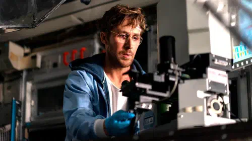 assets/ryan-gosling-s-ryland-looking-at-a-microscope-in-project-hail-mary.jpeg