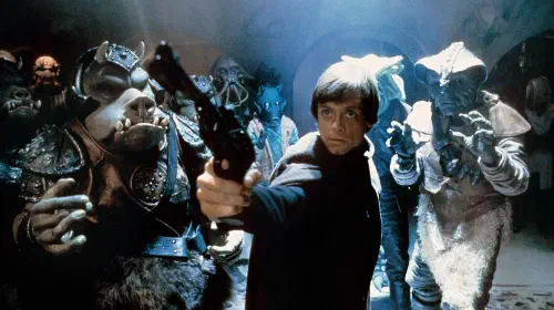 assets/luke-skywalker-pointing-a-blaster-at-jabba-the-hutt.jpeg