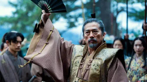 assets/lord-toranaga-waving-his-fan-in-shogun-season-1.jpeg
