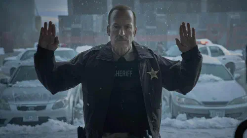 assets/bob-odenkirk-with-his-hands-up-in-normal.jpeg