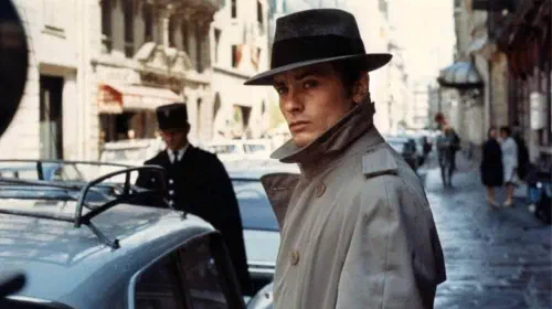 assets/alain-delon-as-jef-costello-standing-outside-in-le-samourai.jpeg
