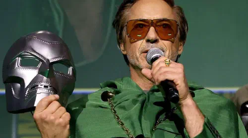 assets/robert-downey-junior-holding-doctor-doom-mask.jpeg