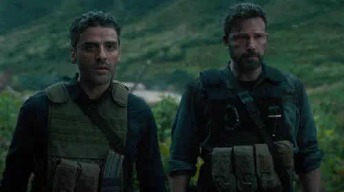 assets/ben_affleck_and_oscar_isaac_in_the_jungle_in_triple_frontier.jpeg