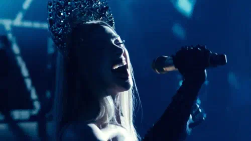 assets/anne-hathaway-as-mother-mary-singing-on-stage-in-mother-mary.jpeg