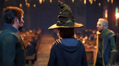 assets/hogwarts-legacy-player-wearing-sorting-hat-in-hogwarts-great-hall.jpeg