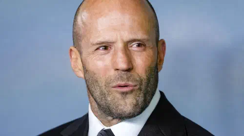 assets/jason-statham-looking-intrigued-on-a-red-carpet.jpeg