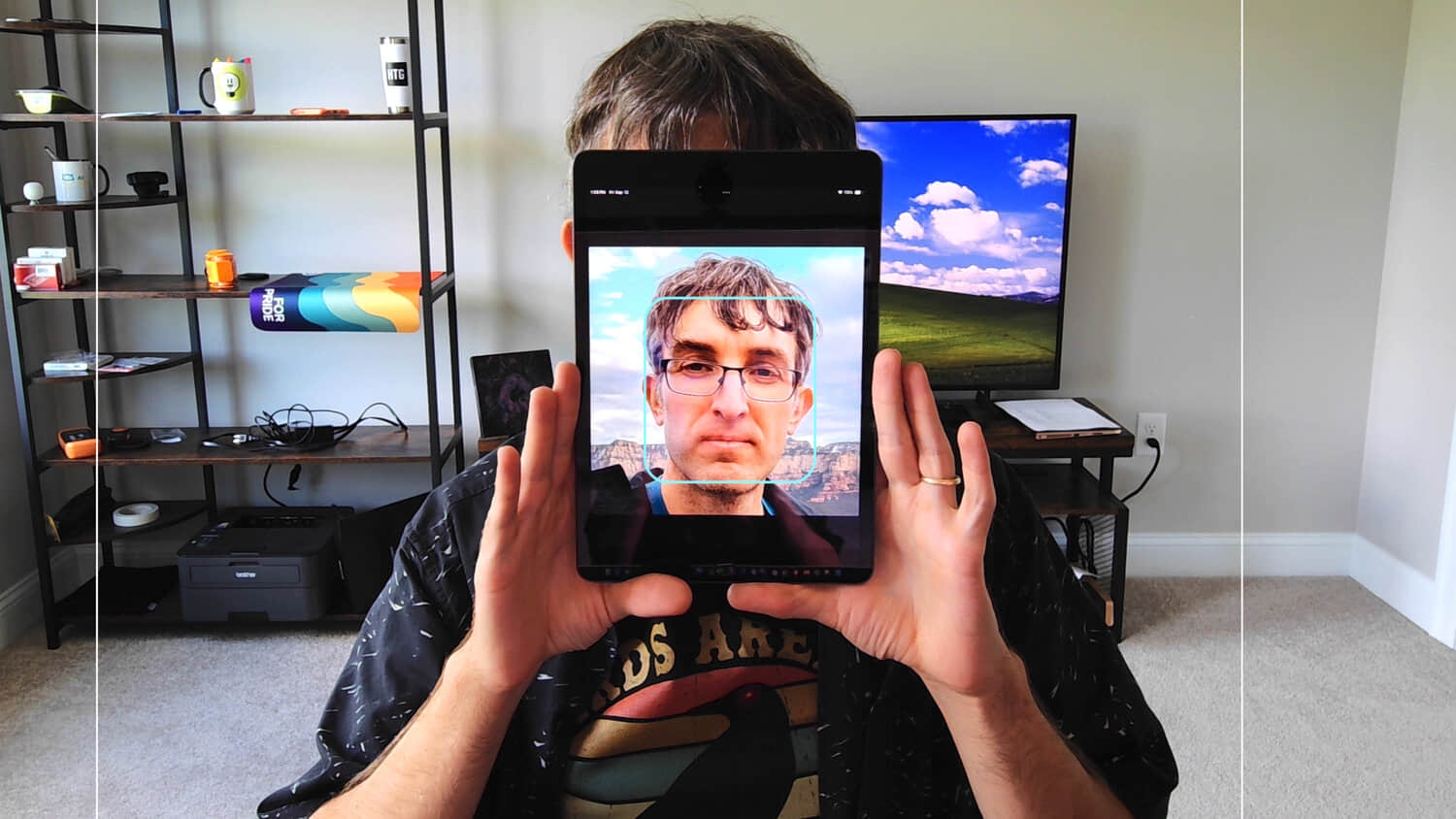 Chris-Hoffman-face-photo-on-iPad-trying-to-fool-Windows-Hello-facial-scan.jpeg