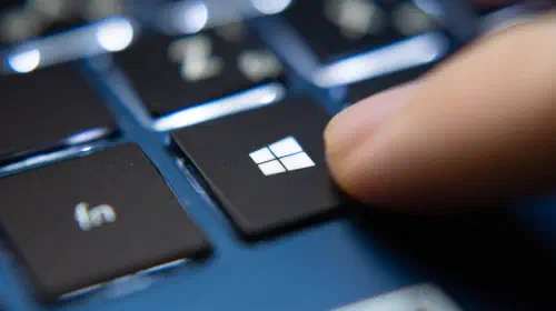 assets/Finger-pressing-Windows-key-on-a-blue-laptop-keyboard-3.jpeg