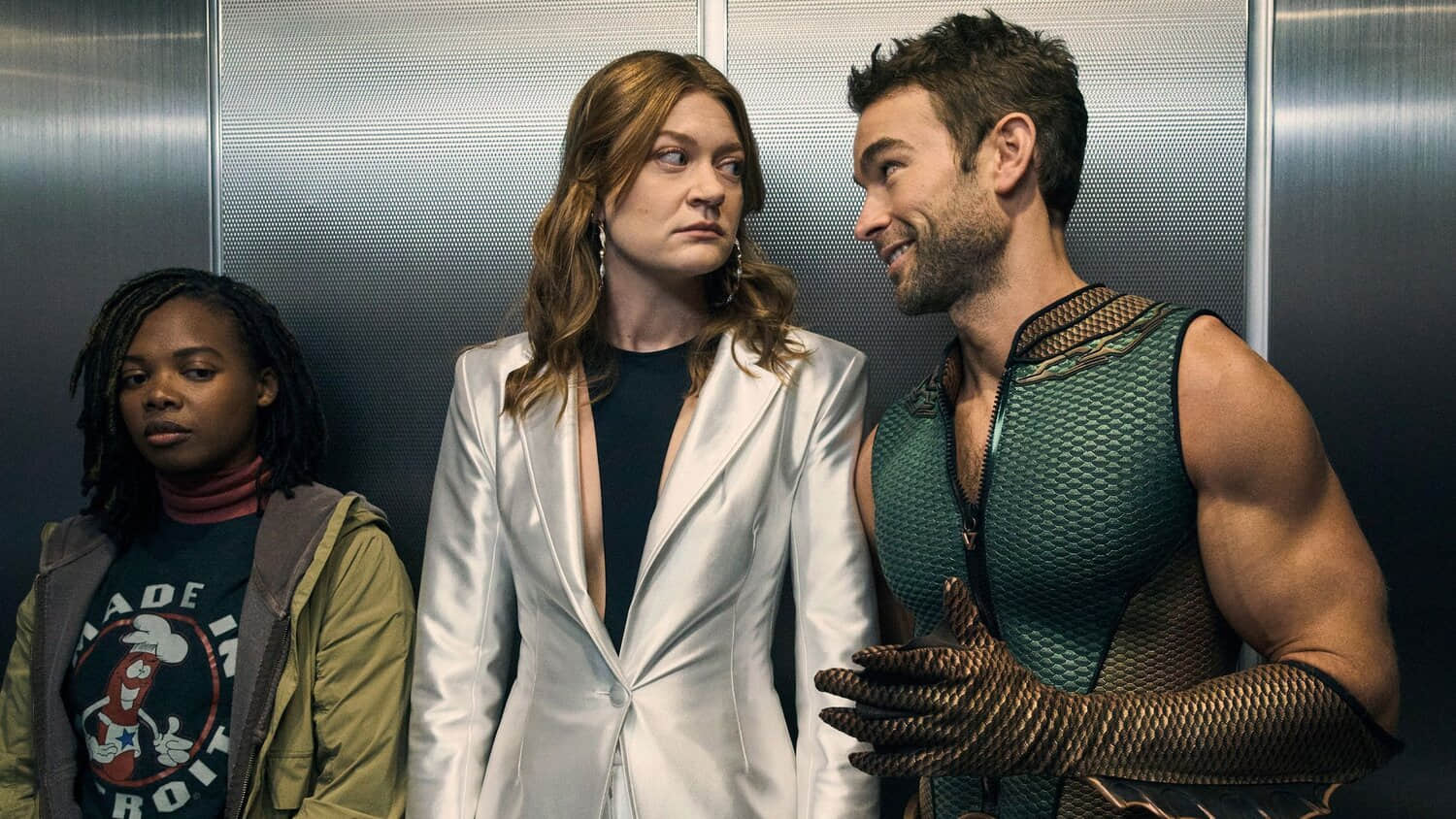 the-deep-and-ashley-looking-at-each-other-inside-an-elevator-while-sister-sage-stands-beside-them-in-the-boys.jpeg