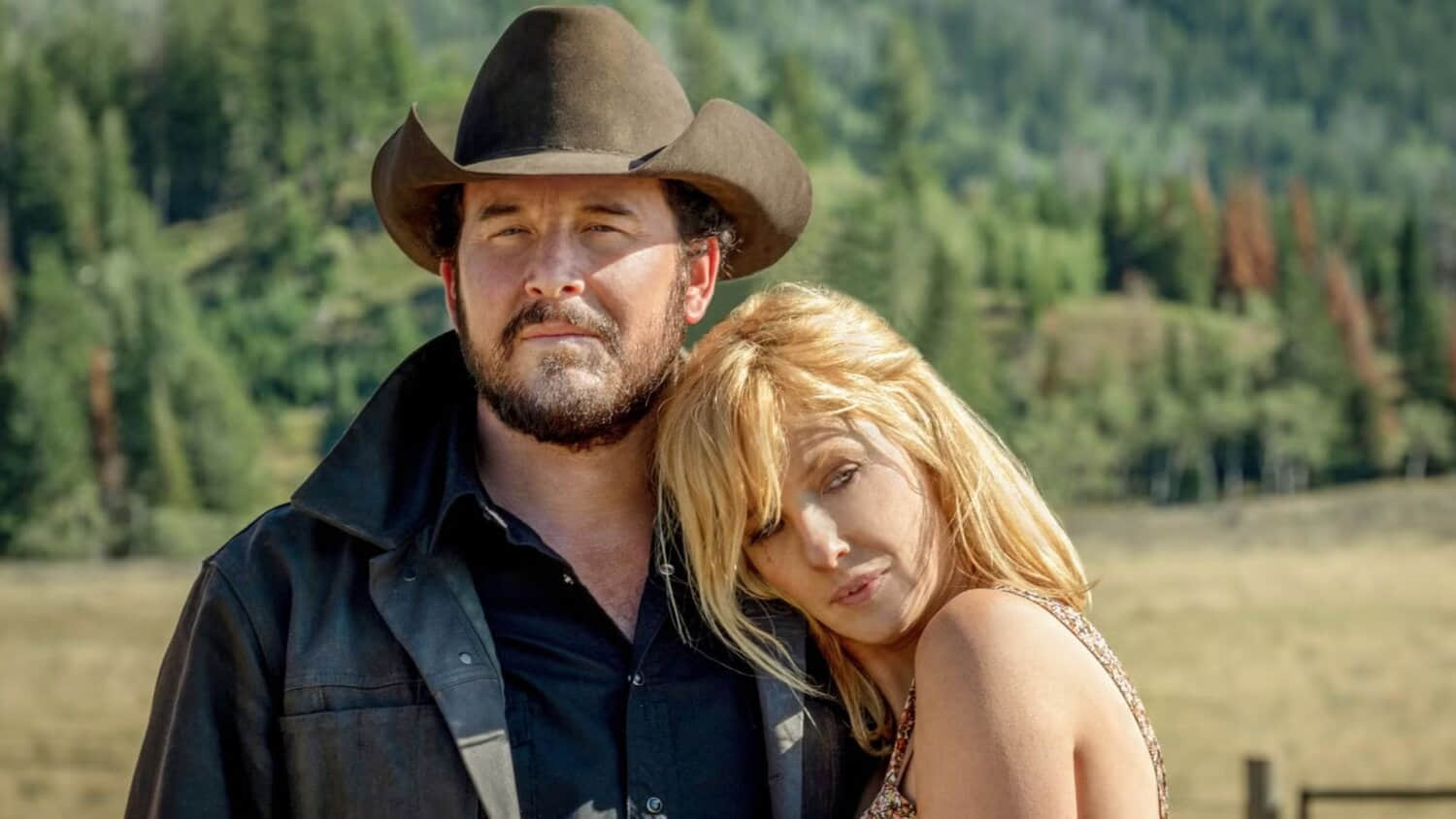 cole-hauser-as-rip-wheeler-standing-with-kelly-reilly-as-beth-dutton-leaning-on-his-shoulder-in-yellowstone-season-3.jpeg